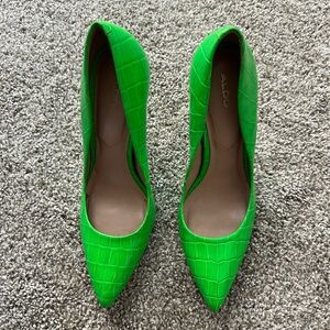 Green pointed shoes from Aldo, size 7.5, used.